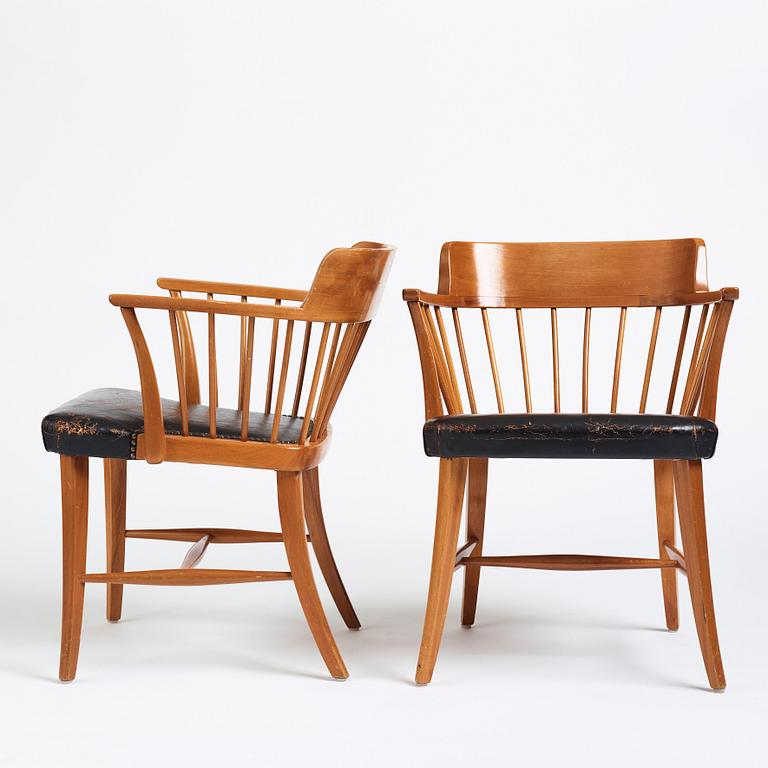 Josef Frank, a pair of mahogany and black leather 'Captain's chair', Svenskt Tenn, model 789B, acquired in 1950.