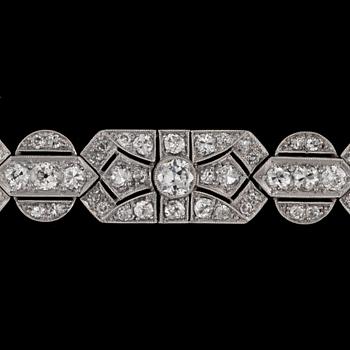 976. An old- and brilliant cut diamond bracelet, tot. app. 8 cts, Art Deco, 1930's.