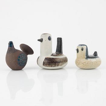 Sylvia Leuchovius, two stoneware figurines, and one figurine by Inger Persson, Rörstrand, Sweden.