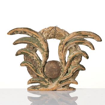 A Swedish baroque carved and painted wreath, later part 17th century.