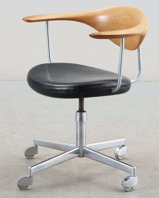 A Hans J Wegner 'Swivel chair', Johannes Hansen, Denmark circa 1960.