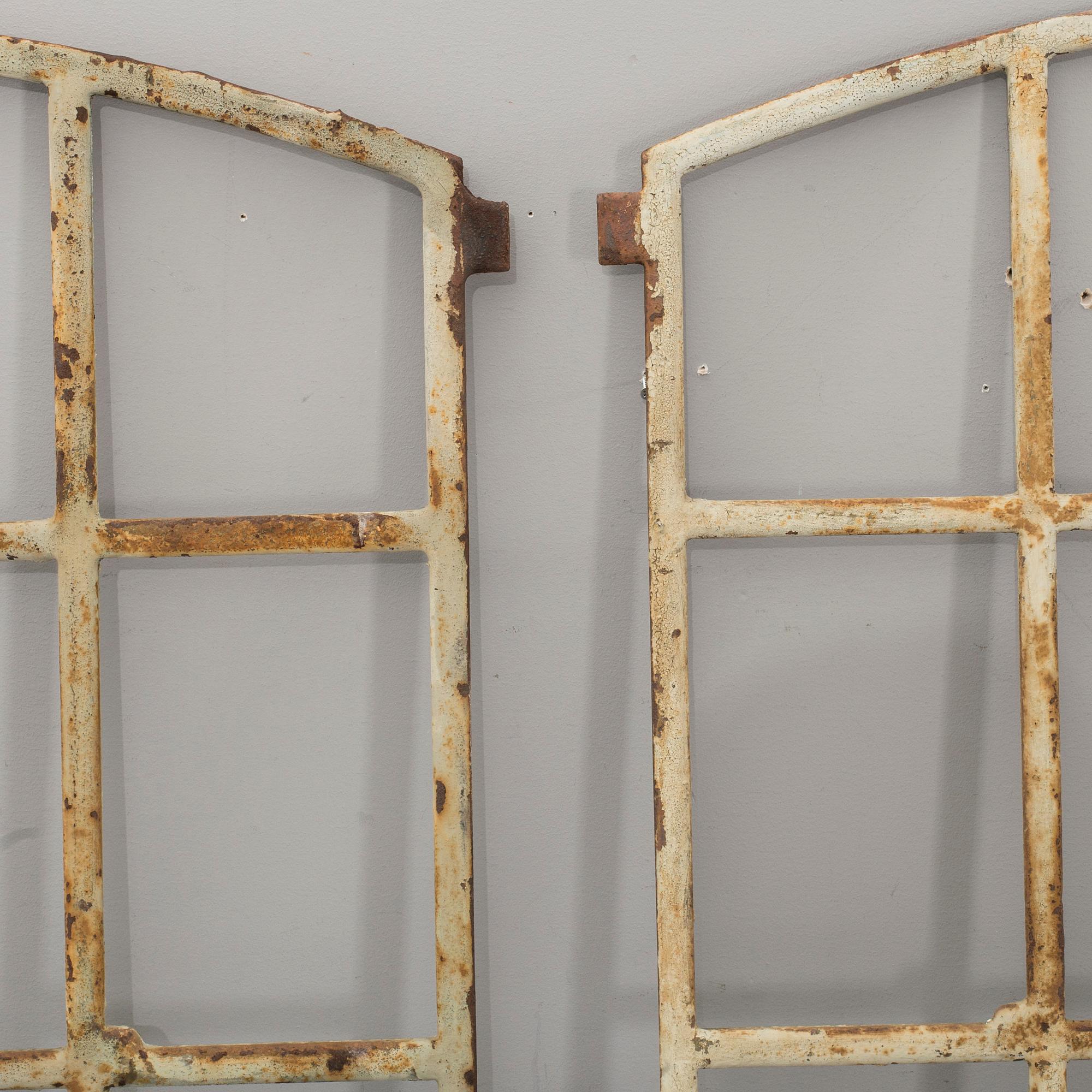 TWO IRON WINDOWS.