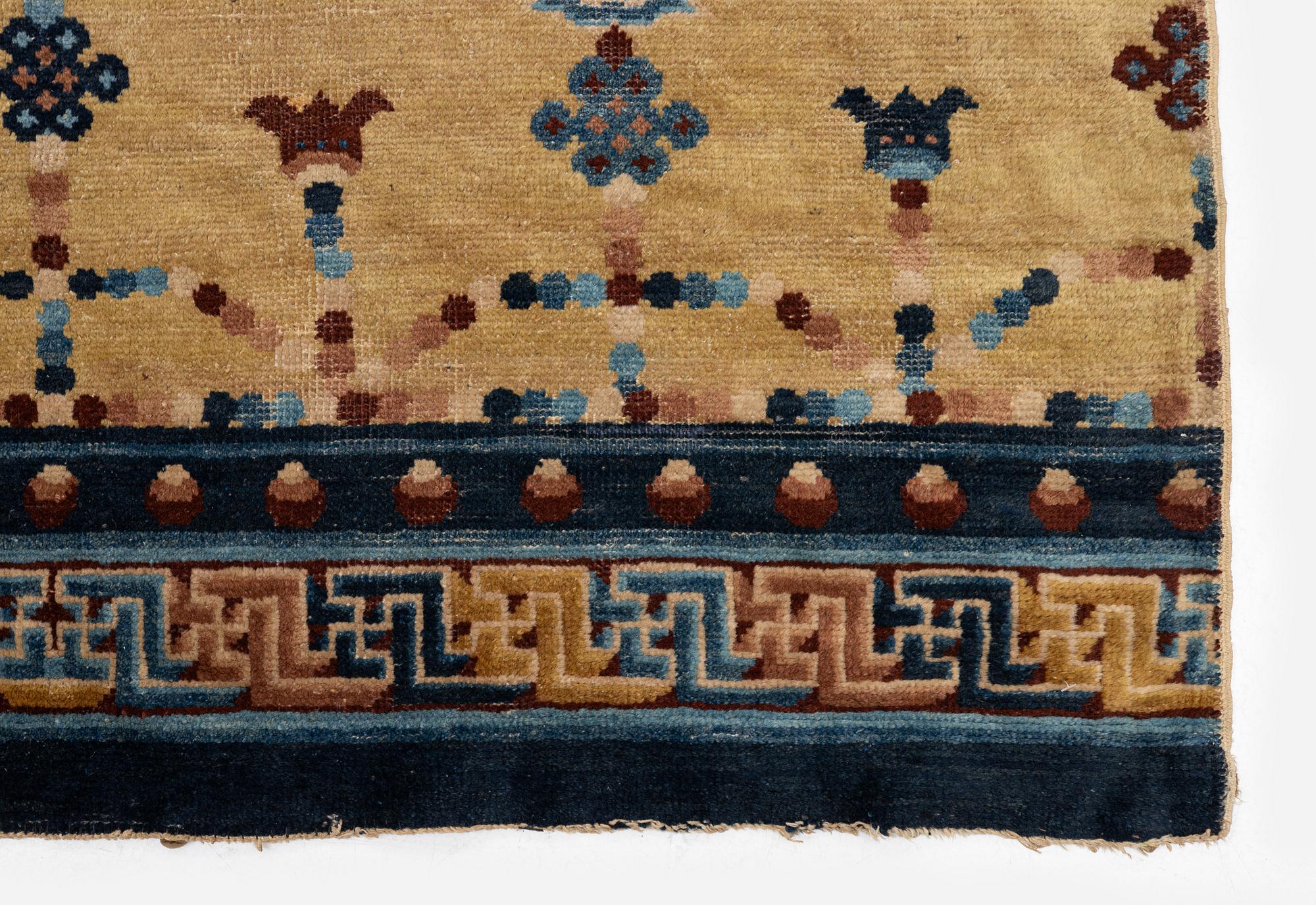 An Antique Ningzia Temple carpet, Northern China. c. 208-131 cm.