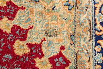 An oriental carpet, c. 290 x 198 cm.