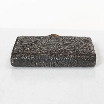 A Russian silver samorodok cigarette case, St. Petersburg 1908-17, unidentified maker's mark, possibly Ivan Arkarov.