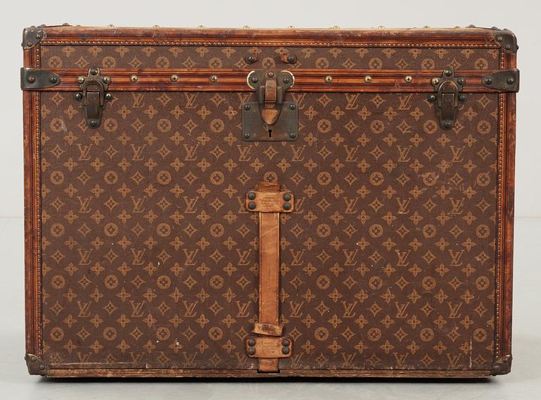 An early 20th cent monogram canvas trunk by Louis Vuitton.