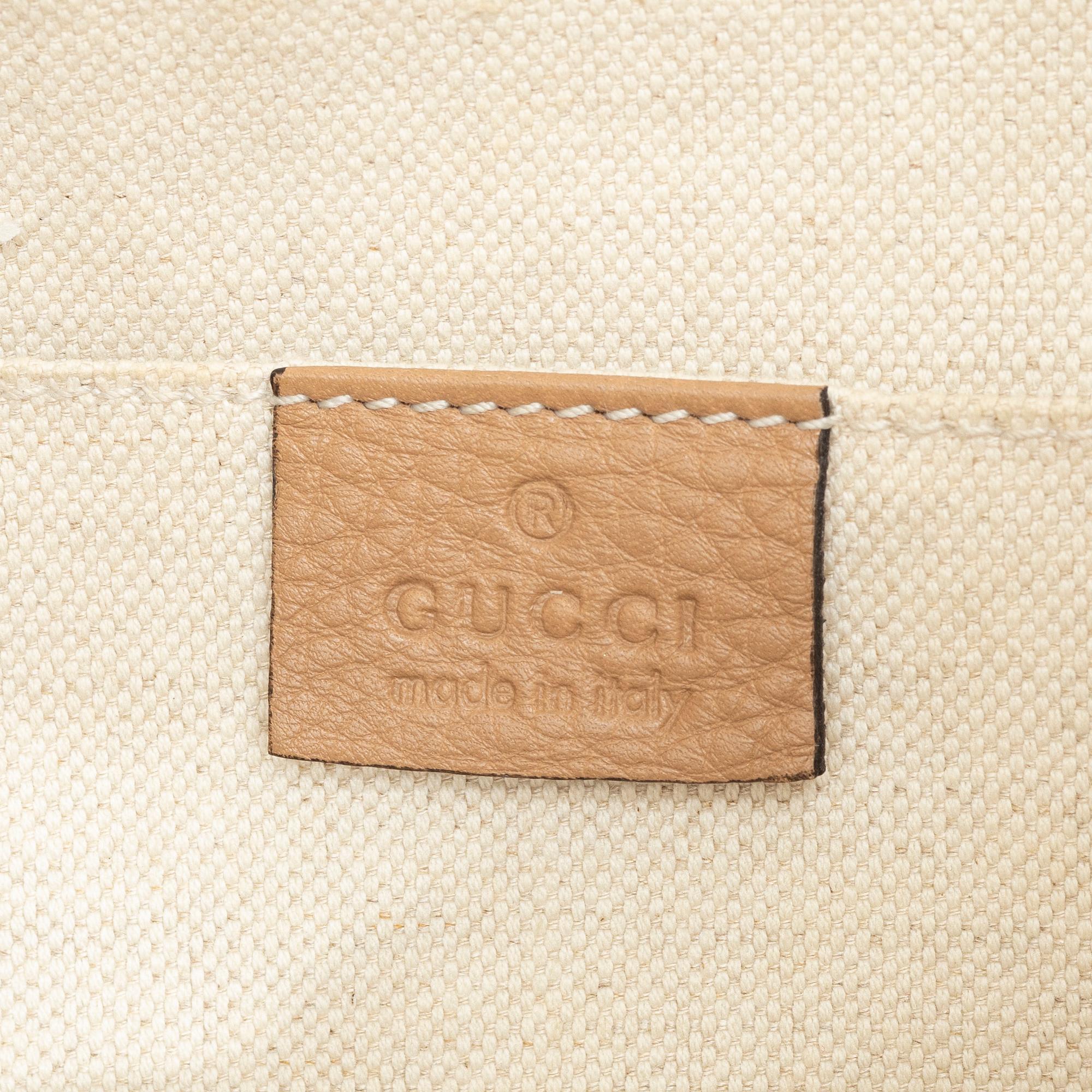 Gucci, a backpack.