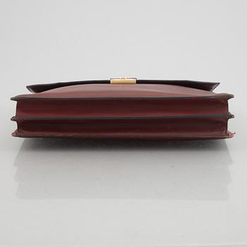 Cartier, a briefcase.