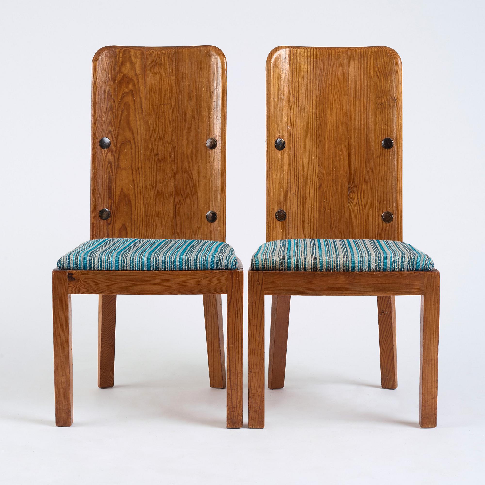 Axel Einar Hjorth, a pair of stained pine "Lovö" chairs, Nordiska Kompaniet, Sweden 1930's.
