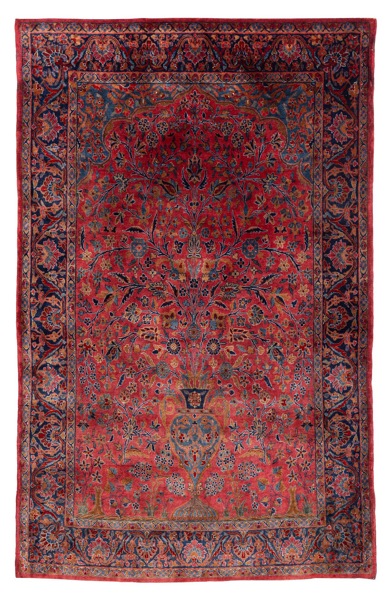 An antique Manchester Kashan rug, c. 197 x 126 cm.