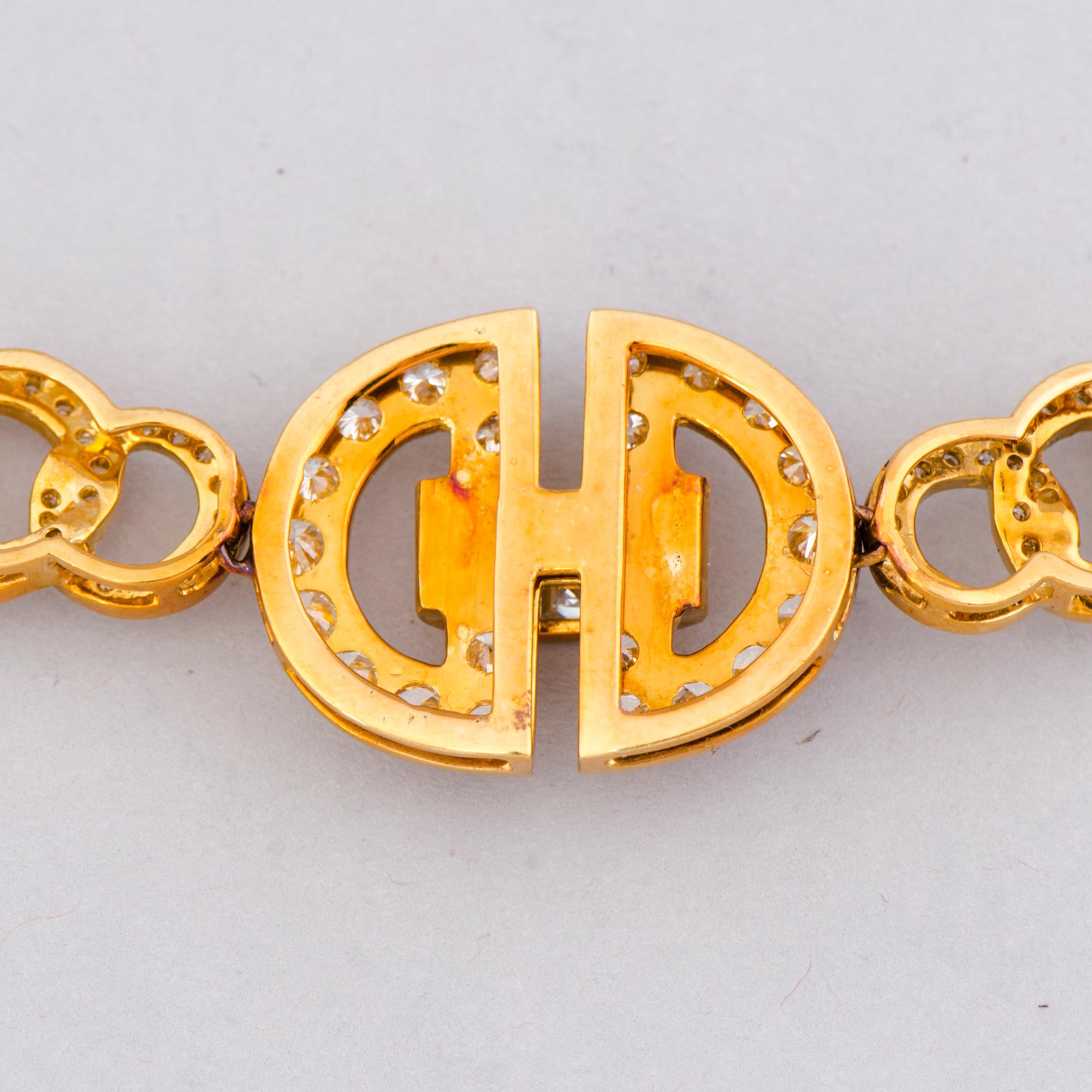 A NECKLACE, brilliant and baguette cut diamonds, 18K gold. Italy.