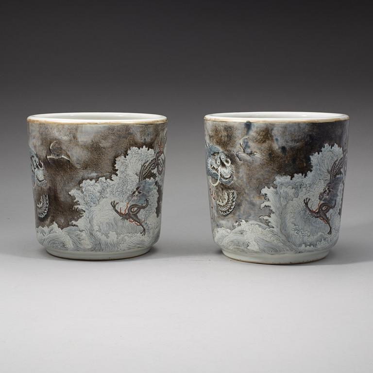 A pair of Chinese enamelled porcelain flower/scroll pots, first half of 20th Century.