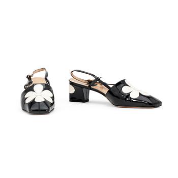 389. LERRE, a pair of black patent leather sandals.