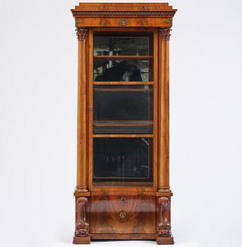 A Swedish Empire mahogany bibliothèque, ca 1830.