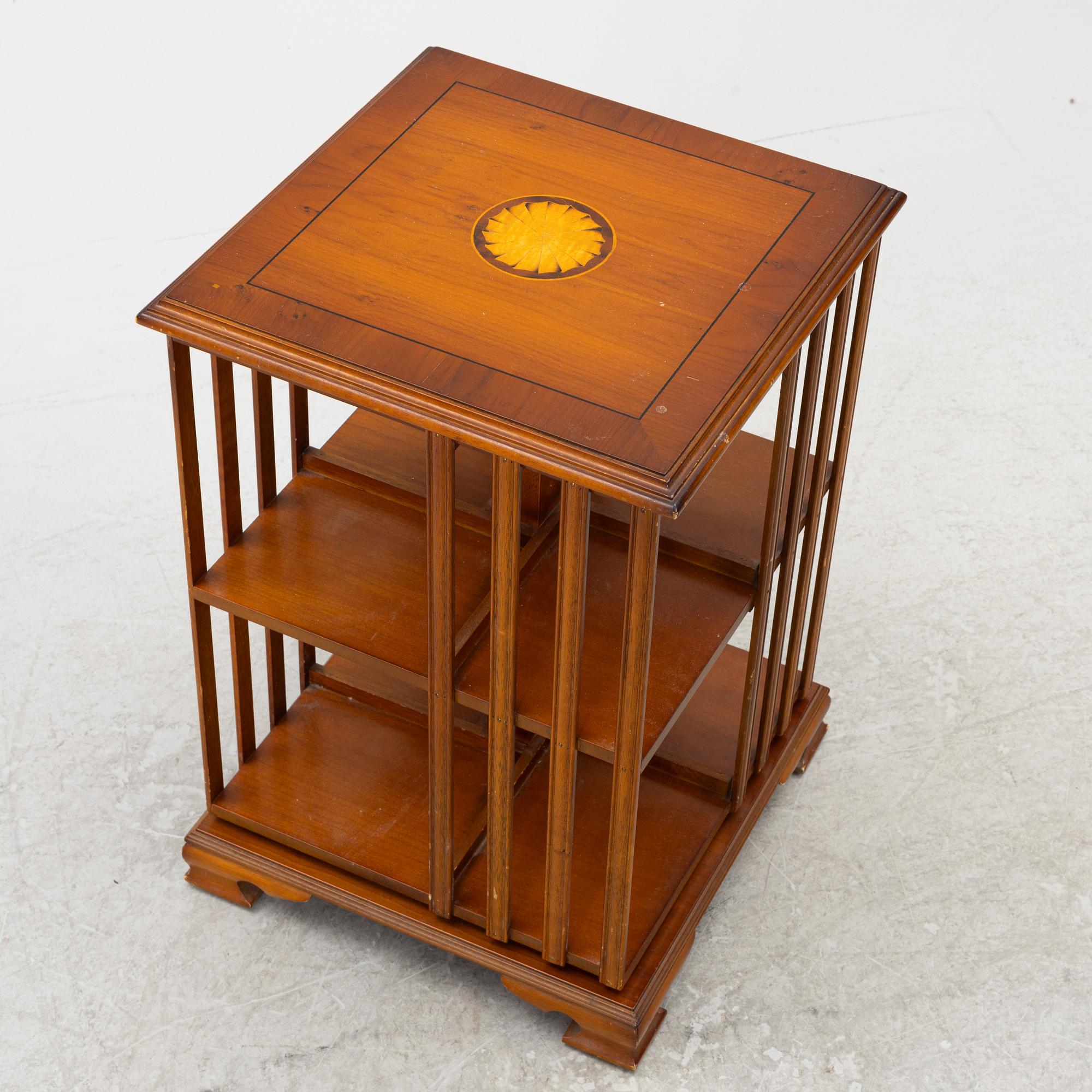 A revolving bookcase, late 20th century.