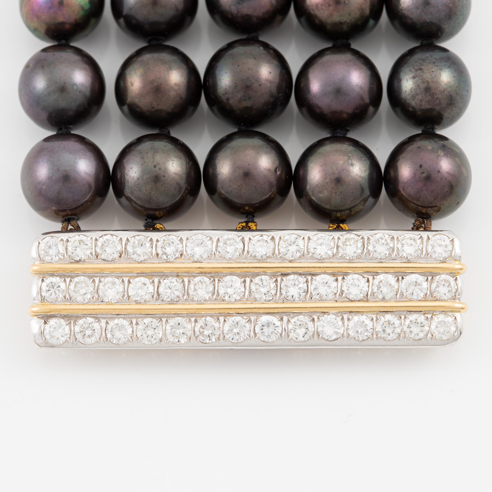 Necklace, five-row with cultured black pearls, 18K gold and white gold with brilliant-cut diamonds.