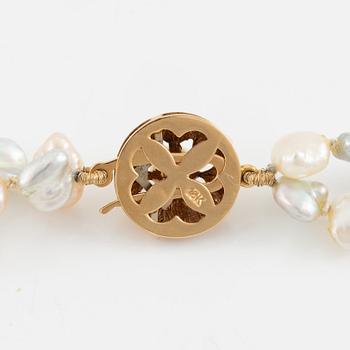 Necklace, double strand with cultured pearls, clasp 18K gold.