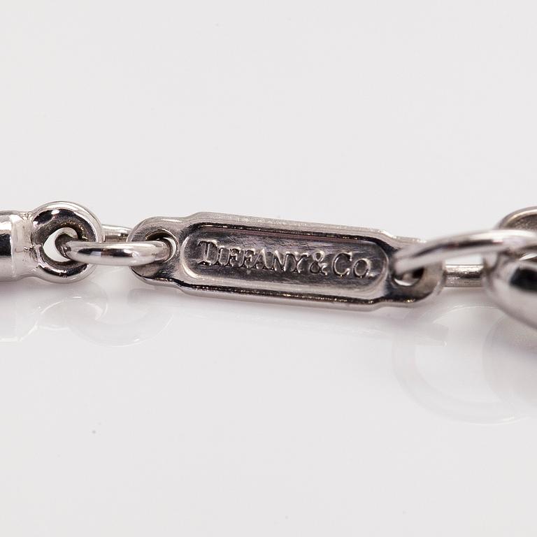 Tiffany & Co, a 18K white gold 'Atlas Bar' necklace with diamonds ca 0.06 ct.