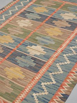 Märta Måås-Fjetterström, A carpet, "Blå taggen", flat weave, ca 304,5-306 x 202,5 cm, signed MMF.