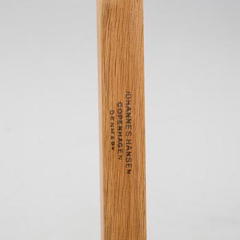 A model JH 575 coffee table by Hans J Wegner for Johannes Hansen.