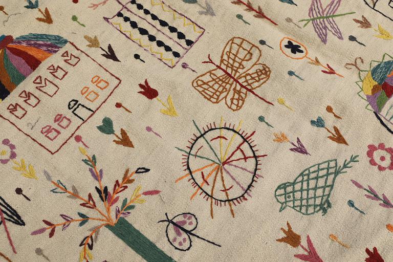 A hand-embroidered Kilim rug, approx. 240 x 181 cm.