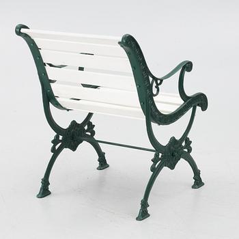 Garden bench, armchair and table, 20th century.