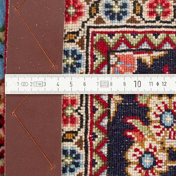 An oriental rug, c. 260 x 162 cm.