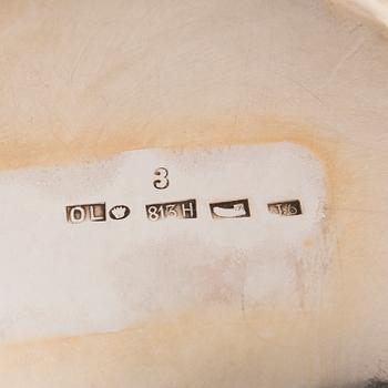 A silver sugar tong and a 3-piece silver coffee set, mark of Juho H. Pekuri, Oulu 1931 and Finnish import marks 1938.