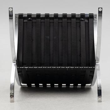 Ludwig Mies van der Rohe, a pair of "Barcelona" lounge chairs, Knoll.
