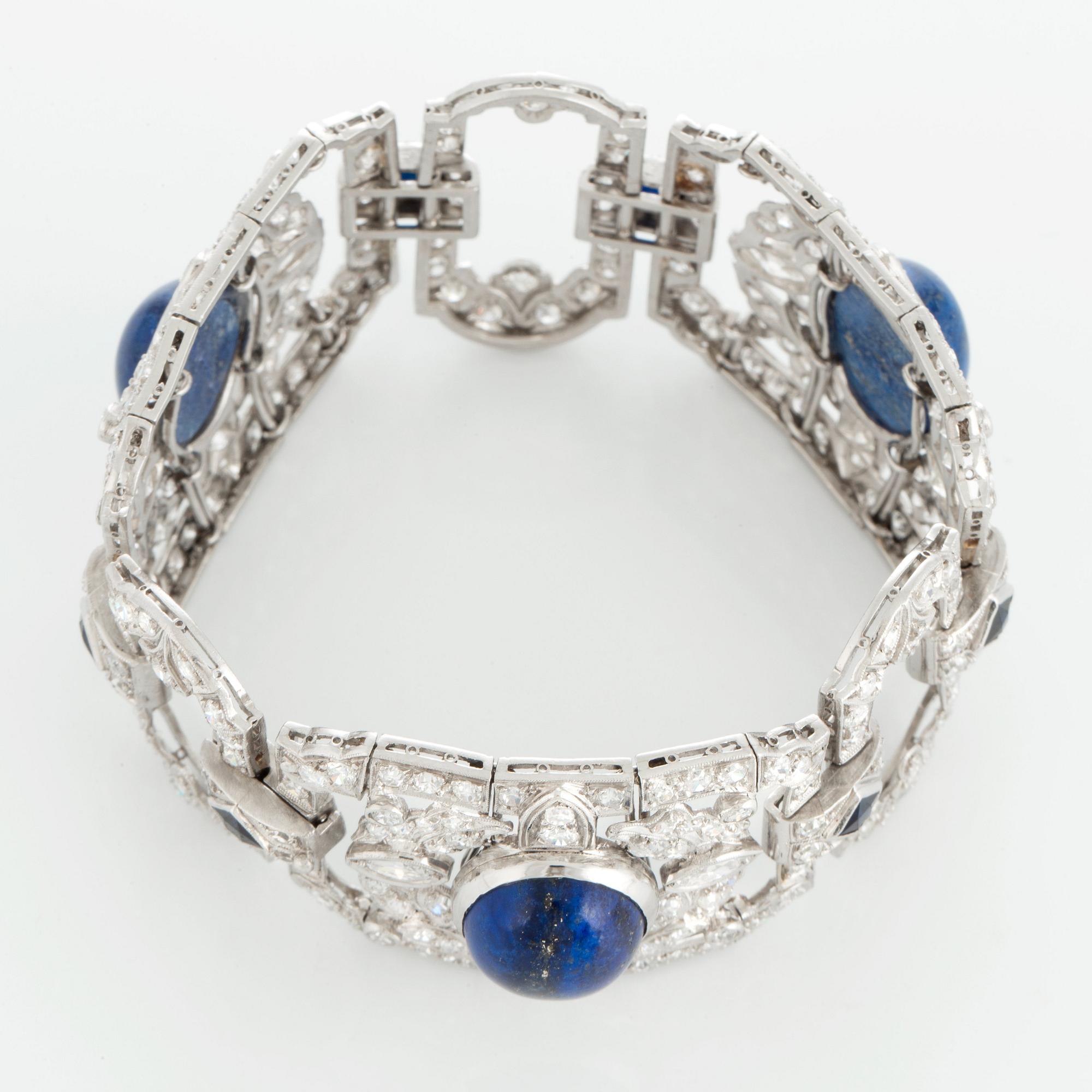 A platinum bracelet set with lapis lazuli, old-cut diamonds with a total weight of ca 10 cts and synthetic sapphires.
