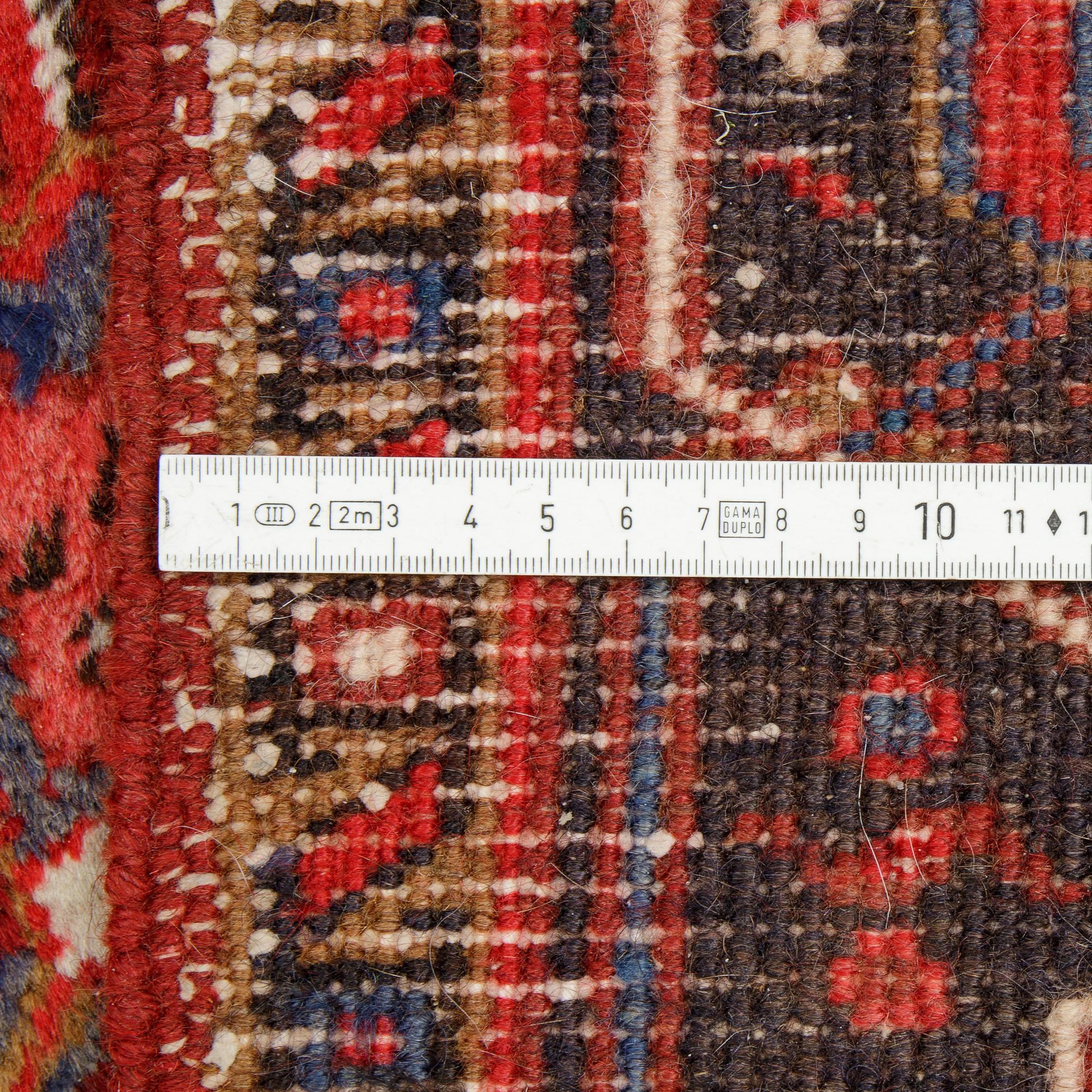 A carpet, semi-antique/old Heriz, ca 340 x 256 cm.
