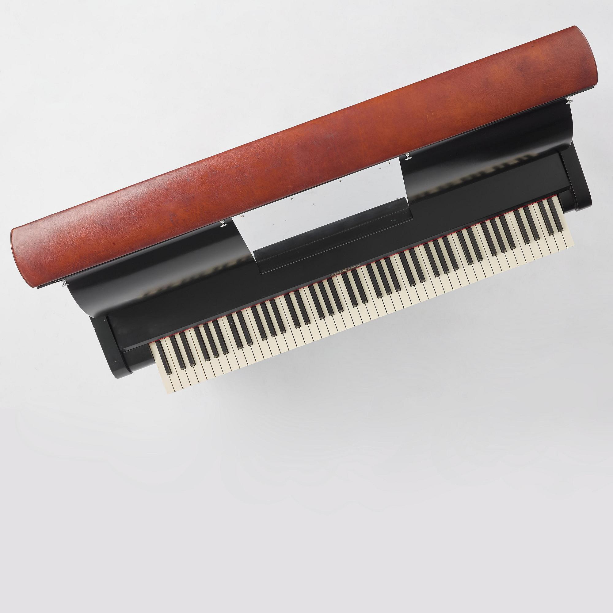 Poul Henningsen, a "PH Upright Piano", executed by Andreas Christensen, Denmark, 1940s.