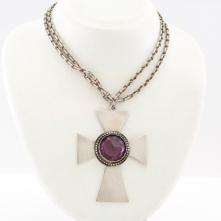 Necklace of silver in the form of a cross with faceted glass.