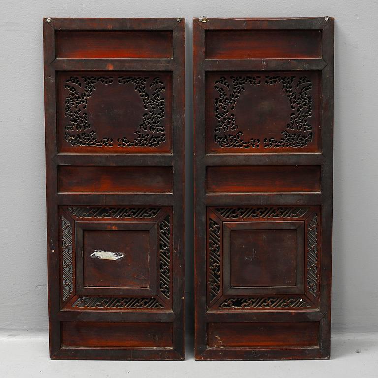 Two Chinese wooden carved panels, 20th century.