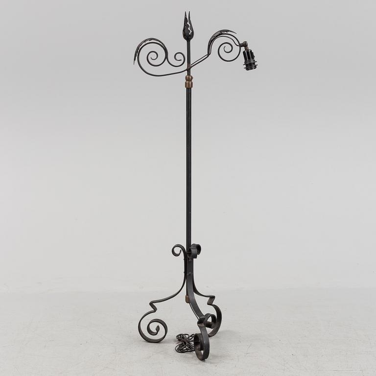 A iron floor light, 1930 / 1940s.