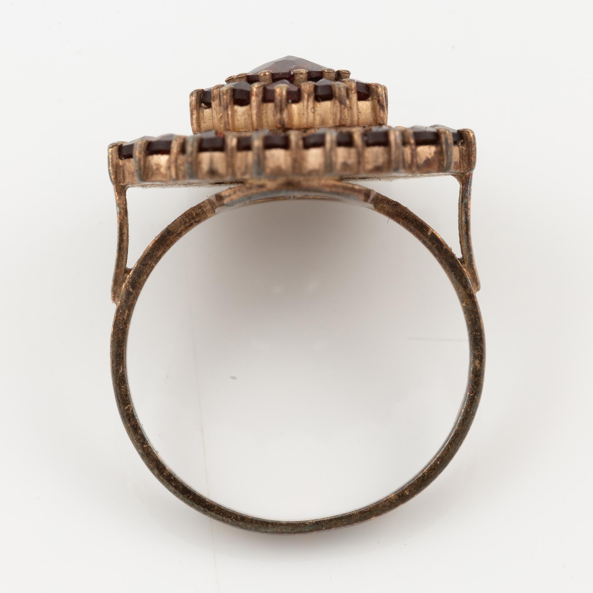 Garniture, two rings, brooch, two necklaces, and two pairs of earrings, armlet, garnets.