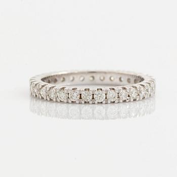 Brilliant cut diamond eternity ring.