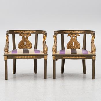 A pair of Empire-style armchairs with an end table, second half of the 20th century.