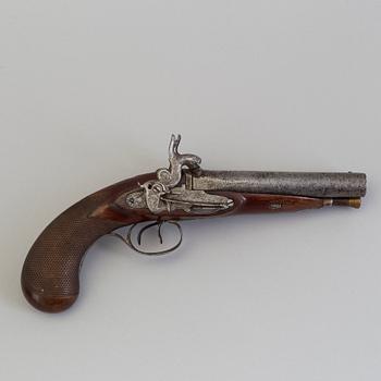 A 19th century double barreled percussion pistol.