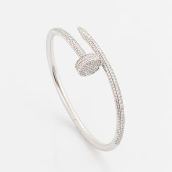 368A. A Cartier "Juste en Clou" bracelet in 18K white gold set with round brilliant-cut diamonds.