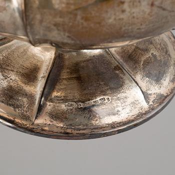 A silver coffee pot, creamer and sugar bowl. Kultakeskus Oy, Hämeenlinna, Finland 1943.