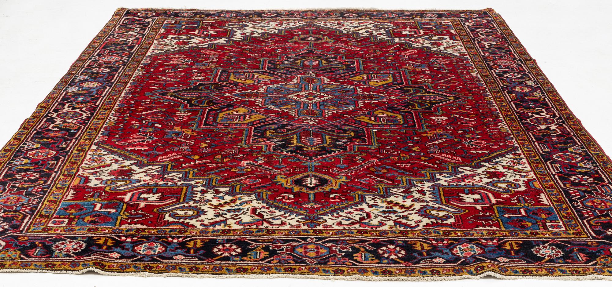 A carpet, Heriz, ca 315 x 243 cm.