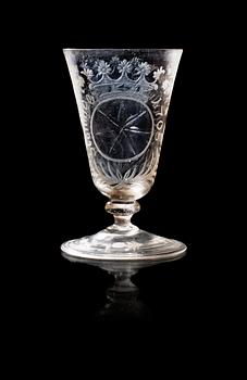 1195. A Swedish wine glass, Kungsholm´s glass manufactory, engraved Steninge and dated 1705.