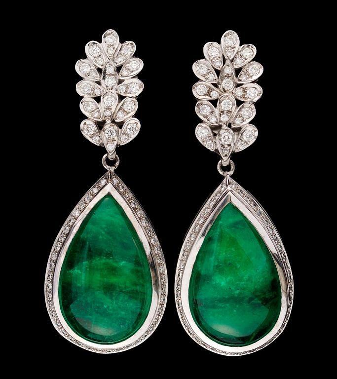 A pair of emerald drop and diamond earrings.