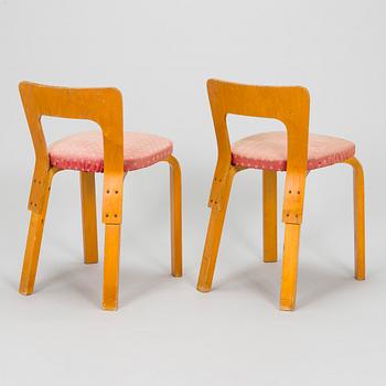 Alvar Aalto, a pair of  'A65' chairs for O.Y. Huonekalu- ja Rakennustyötehdas A.B. early 1940s.