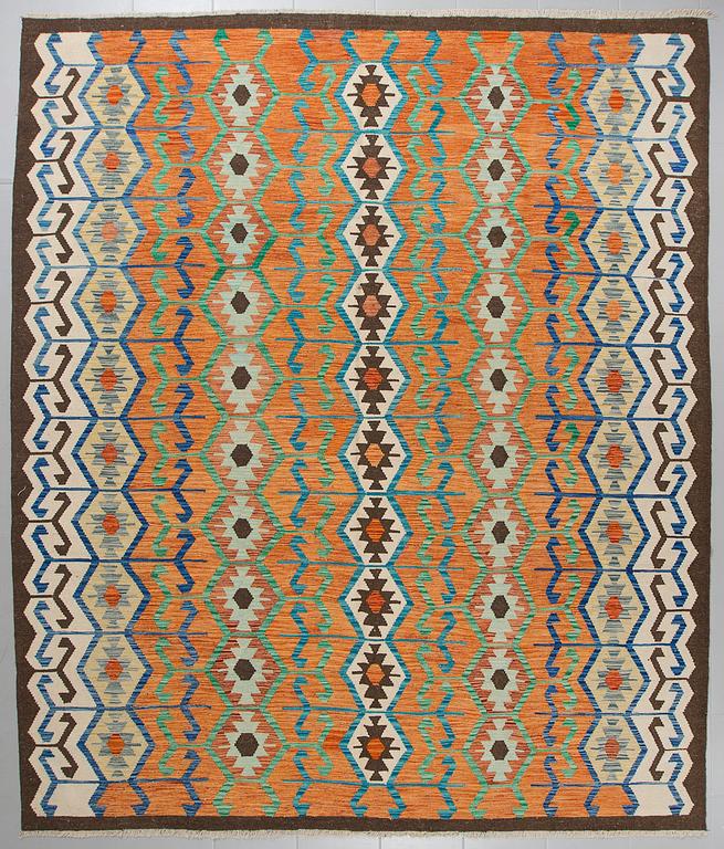 A KILIM RUG, 300 x 254 cm.