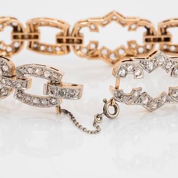 A 14K gold and platinum bracelet set with rose-cut diamonds.