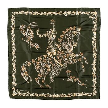 A silk scarf by Hermès,