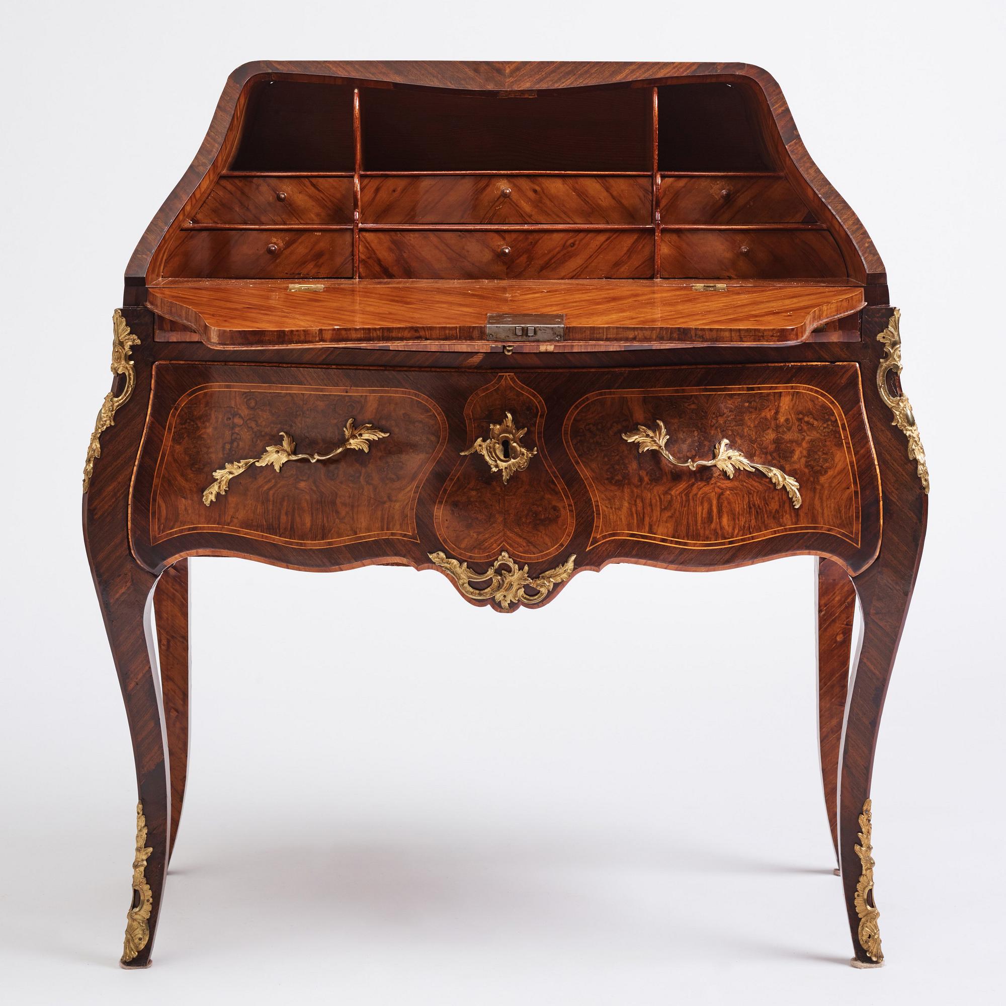 A rosewood, walnut, and gilt brass-mounted rococo secretaire by J. H. Reimers (master in Stockholm 1754-73).