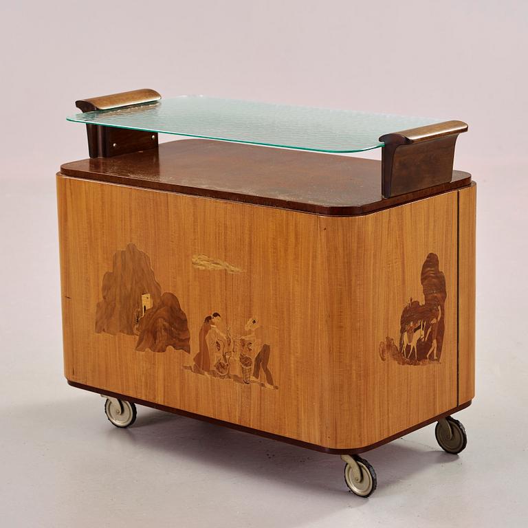 BIRGER EKMAN, "Vinet skördas och pressas", barvagn Mjölby Intarsia, 1940-tal.